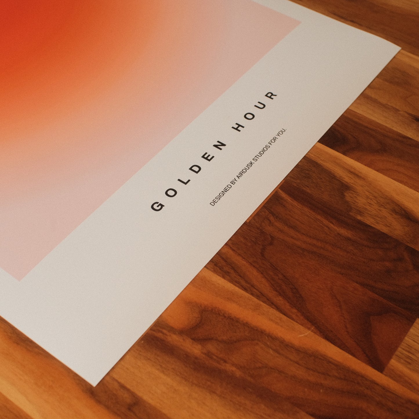 Minimal premium poster wall art showcasing a smooth gradient transitioning from vibrant orange to subtle pink, inspired by midcentury modern aesthetics.