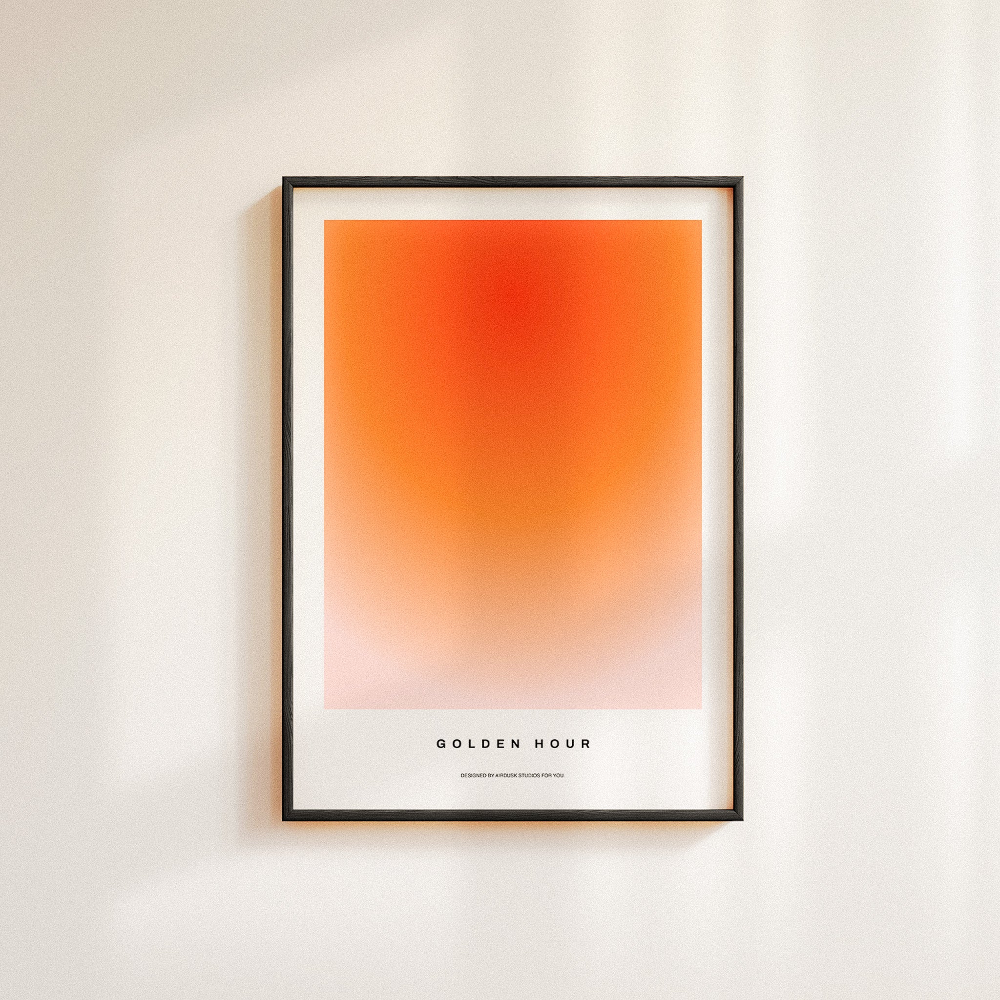 Framed GOLDEN HOUR poster, minimalist wall art showcasing a smooth gradient transitioning from vibrant orange to subtle pink, inspired by midcentury modern aesthetics.